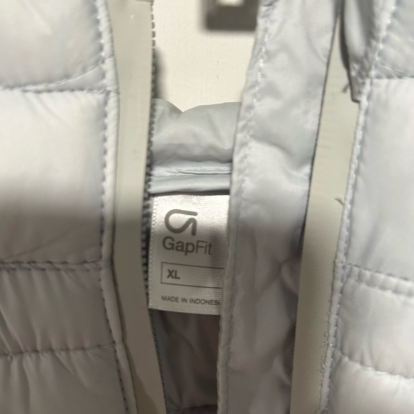 Light blue lightweight puffer coat with fleece sleeves. - Picture 5 of 5